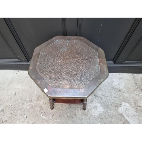 1057 - A circa 1900 mahogany and hammered copper octagonal occasional table, 52cm wide. ... 