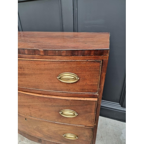 1061 - A Regency mahogany bowfront chest of drawers, 91cm wide.  