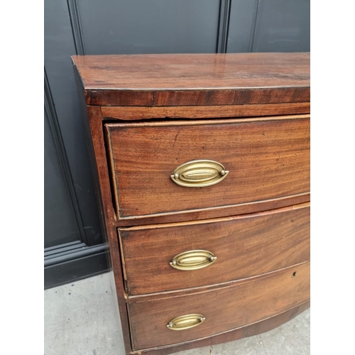 1061 - A Regency mahogany bowfront chest of drawers, 91cm wide.  