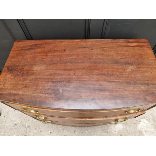 1061 - A Regency mahogany bowfront chest of drawers, 91cm wide.  