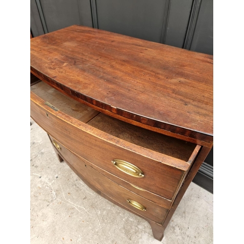 1061 - A Regency mahogany bowfront chest of drawers, 91cm wide.  