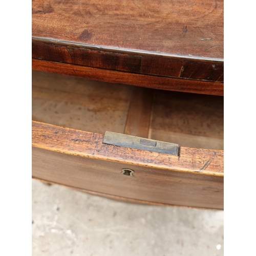 1061 - A Regency mahogany bowfront chest of drawers, 91cm wide.  