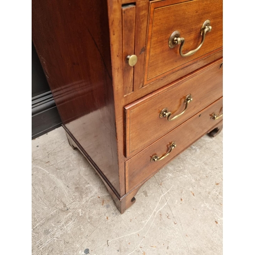 1062 - A small Edwardian mahogany and inlaid bureau bookcase, 66.5cm wide.