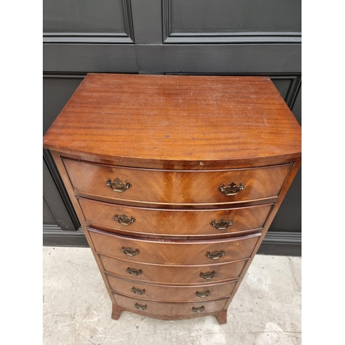 1065 - A reproduction mahogany bowfront chest of drawers, 62cm wide.