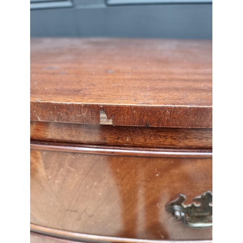 1065 - A reproduction mahogany bowfront chest of drawers, 62cm wide.