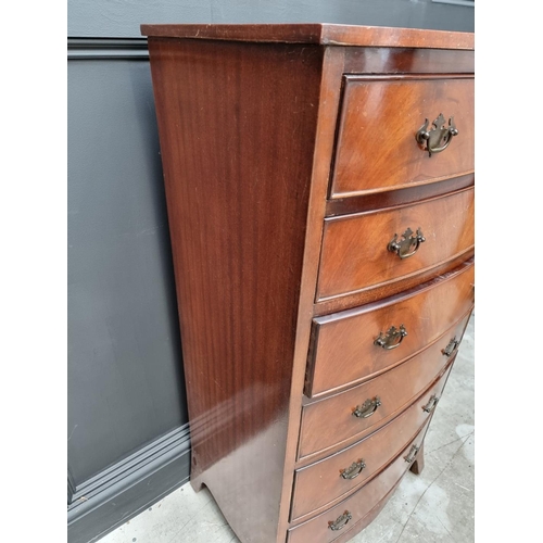 1065 - A reproduction mahogany bowfront chest of drawers, 62cm wide.