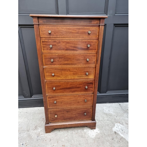 1066 - A late Victorian mahogany and satinwood crossbanded Wellington chest, 60.5cm wide.  ... 