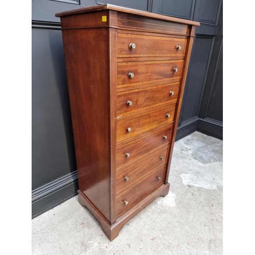 1066 - A late Victorian mahogany and satinwood crossbanded Wellington chest, 60.5cm wide.  ... 