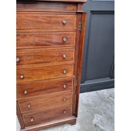 1066 - A late Victorian mahogany and satinwood crossbanded Wellington chest, 60.5cm wide.  ... 