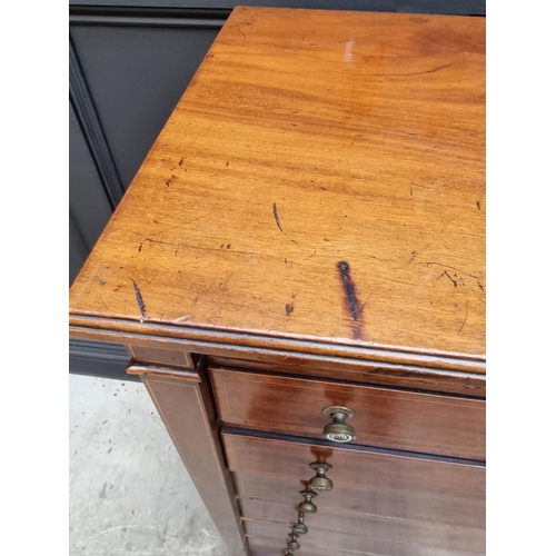 1066 - A late Victorian mahogany and satinwood crossbanded Wellington chest, 60.5cm wide.  ... 