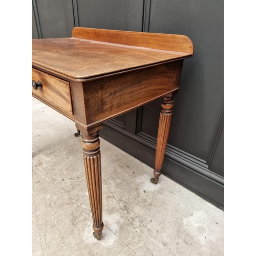 1067 - A Regency mahogany two drawer side table, possibly Gillows, 86cm wide. 