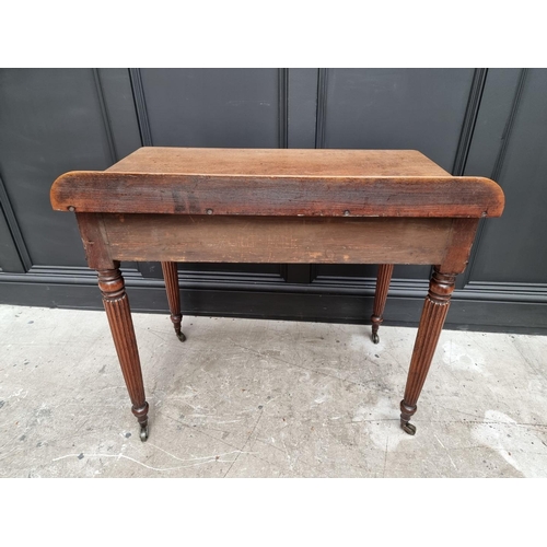 1067 - A Regency mahogany two drawer side table, possibly Gillows, 86cm wide. 