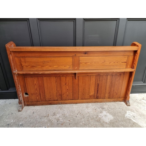 1074 - A Victorian pitch pine pew back, 162cm wide.