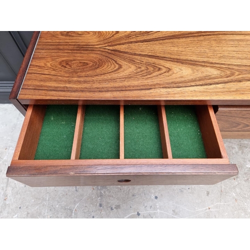 1089 - A mid-century rosewood side table, 152.5cm wide.