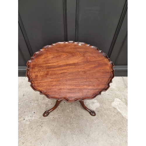 1093 - A George III mahogany pie crust tilt top tripod table, with one piece top, 75cm wide. ... 