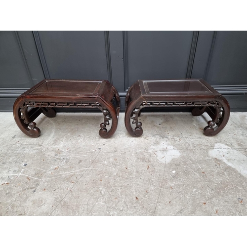 1096 - A pair of Chinese carved and stained wood opium tables, 64cm wide. 