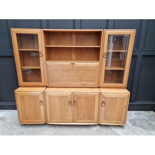 1097 - An Ercol modular side cabinet, 185.5cm wide. 