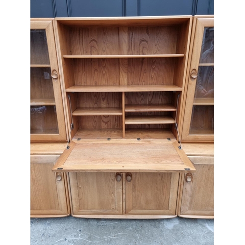 1097 - An Ercol modular side cabinet, 185.5cm wide. 