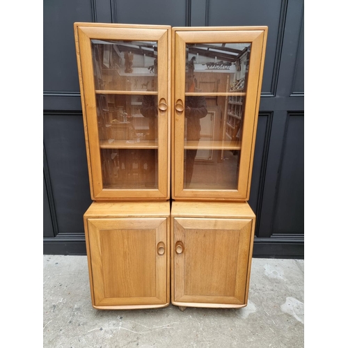 1097 - An Ercol modular side cabinet, 185.5cm wide. 