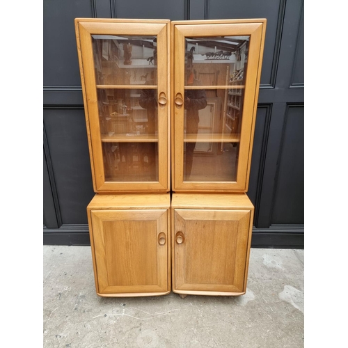 1097 - An Ercol modular side cabinet, 185.5cm wide. 