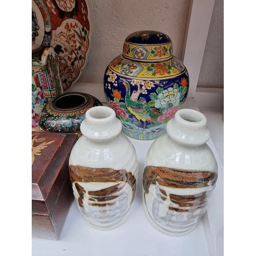 1133 - A mixed group of Chinese and Japanese ceramics and works of art. 