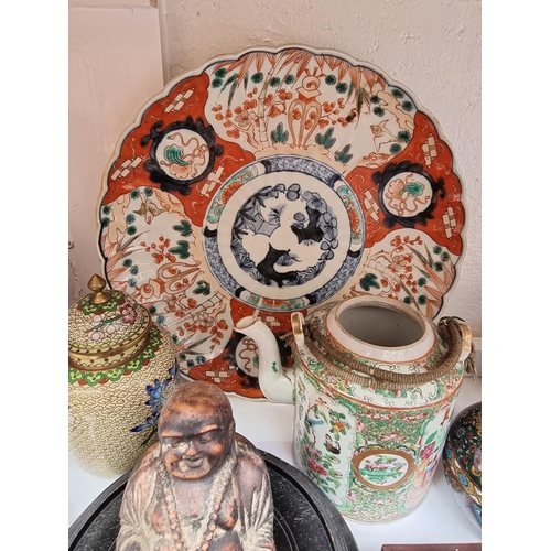 1133 - A mixed group of Chinese and Japanese ceramics and works of art. 