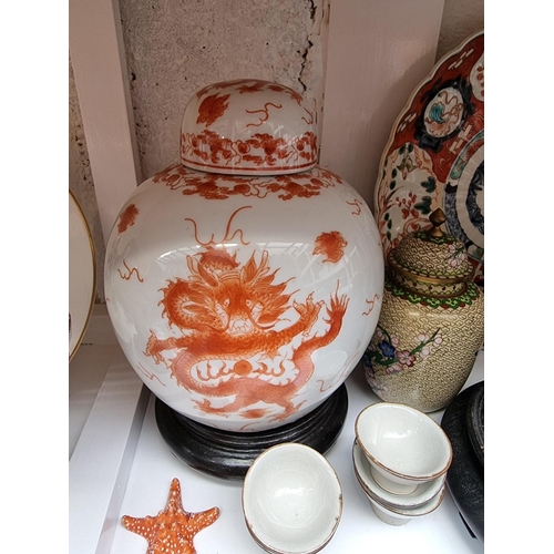 1133 - A mixed group of Chinese and Japanese ceramics and works of art. 