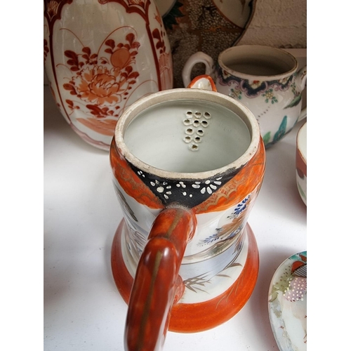 1139 - A mixed group of Chinese and Japanese pottery and porcelain, to include two yixing teapots and cover... 