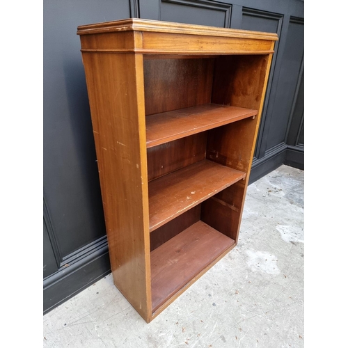 1151 - A reproduction mahogany open bookcase, 68cm wide. 