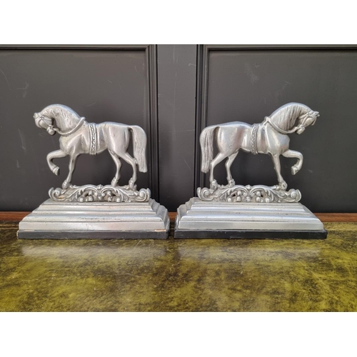 1168 - A pair of aluminium horse doorstops, 27.5cm high.