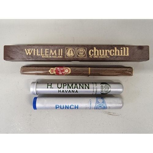 217 - Three cigars, comprising: a Willem II 'Churchill', in box; an H Upmann 'Royal Corona', in metal tube... 