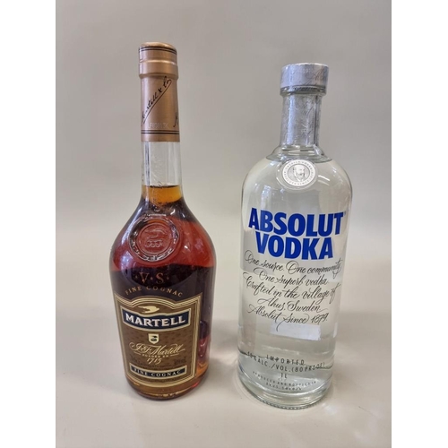 69 - A 70cl bottle of Martell VS cognac; together with a 1 litre bottle of Absolut vdka. (2)... 