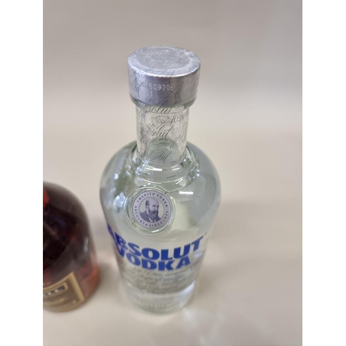 69 - A 70cl bottle of Martell VS cognac; together with a 1 litre bottle of Absolut vdka. (2)... 