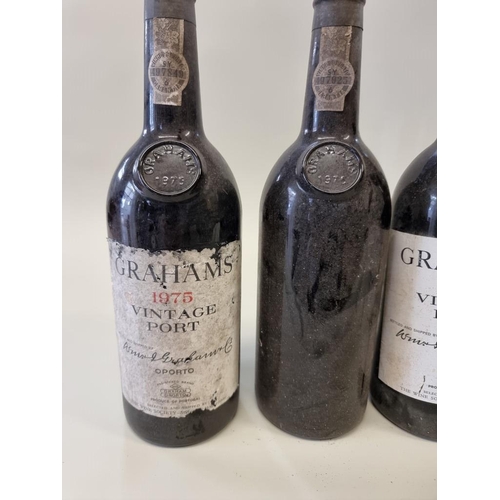 77 - Six bottles of Graham's 1975 vintage port, (one lacking label). (6)