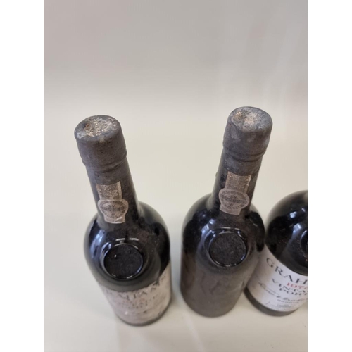 77 - Six bottles of Graham's 1975 vintage port, (one lacking label). (6)