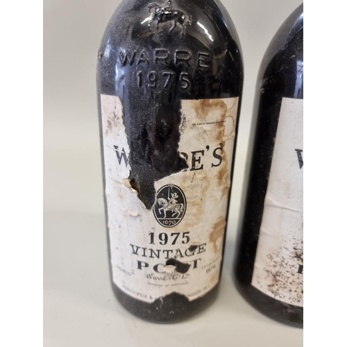 84 - Two 75cl bottles of Warre's 1975 vintage port. (2)