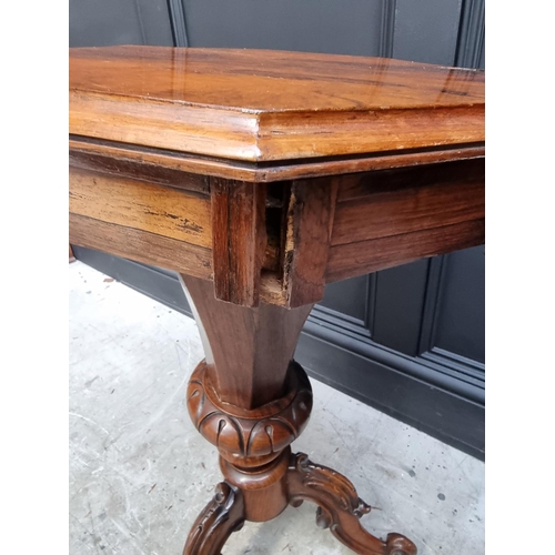 1100 - A Victorian rosewood octagonal trumpet work table, 44cm wide.