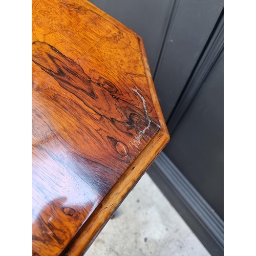 1100 - A Victorian rosewood octagonal trumpet work table, 44cm wide.