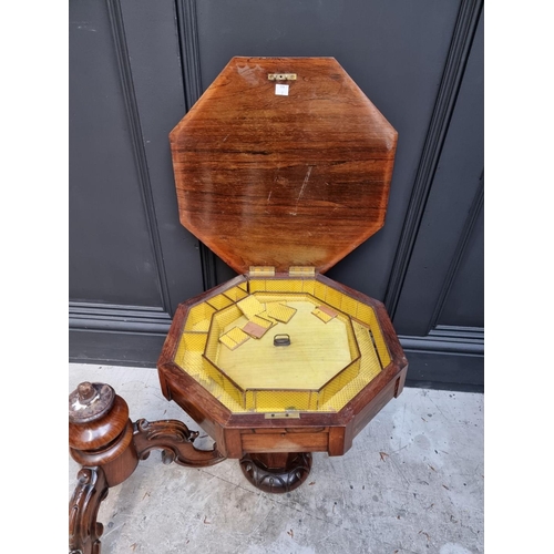 1100 - A Victorian rosewood octagonal trumpet work table, 44cm wide.