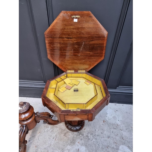 1100 - A Victorian rosewood octagonal trumpet work table, 44cm wide.