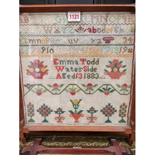 1121 - Two Victorian woolwork samplers, one by 'Emma Todd, Waterside, Aged 13, 1883', 31 x 31cm; the second... 