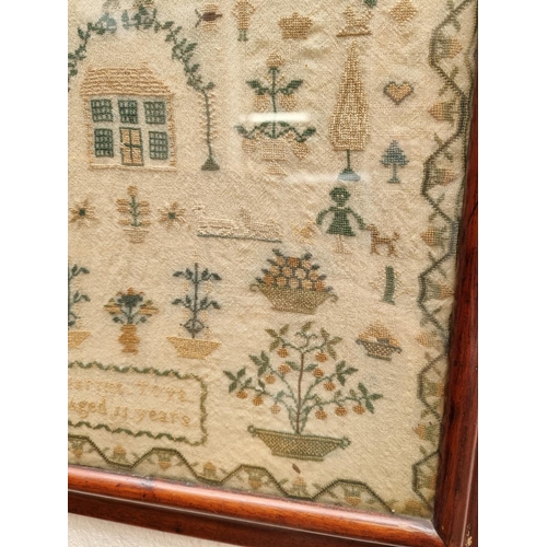 1122 - A 19th century needlework sampler, by 'Harriet Toye, Aged 11 Years', 38 x 30.5cm.