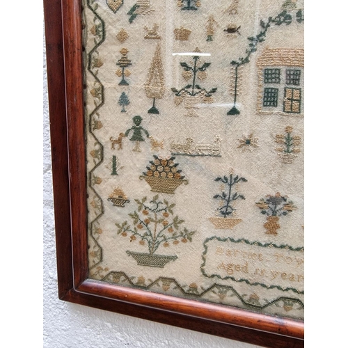 1122 - A 19th century needlework sampler, by 'Harriet Toye, Aged 11 Years', 38 x 30.5cm.