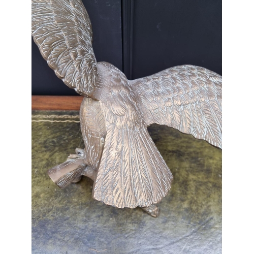 1157 - A large brass eagle, 55.5cm high. 