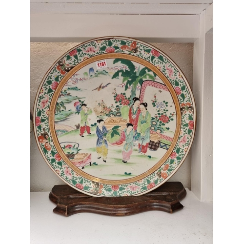 1161 - A large famille rose charger, 45cm diameter; together with a large Japanese vase and cover, 46.5cm h... 