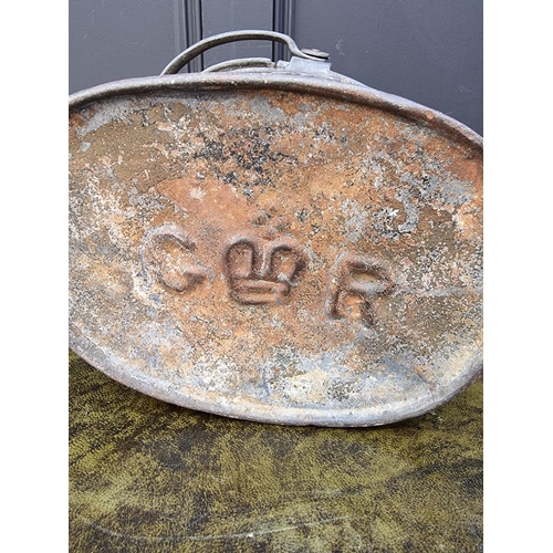 1164 - A galvanized hot water can, the base inscribed with crown and G R sypher, 33cm high. ... 