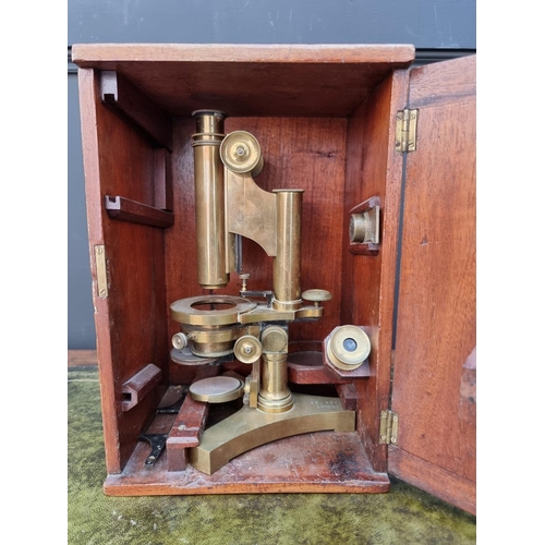 1170 - A brass microscope, by R & J Beck, No.19431, in mahogany box. 