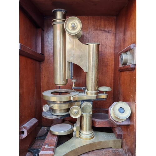 1170 - A brass microscope, by R & J Beck, No.19431, in mahogany box. 