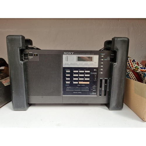 1177 - Radios: a Sony ICF-2001, boxed; together with a Sony ICF-SW77; and a Bush TR82/97. (3)... 