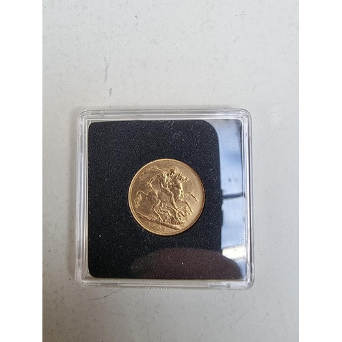 298 - Coins: a Edward VII 1904 gold sovereign, with box.